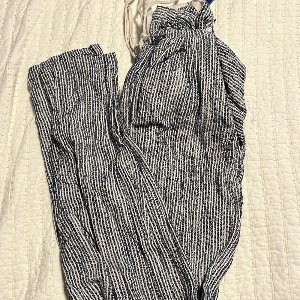 Free people boho pants that are tighter in the bottom.